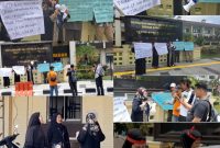 Emak-emak yang mengaku jadi korban kriminalisasi membawa sejumlah poster di depan Mapolrestabes Medan, Rabu (3/9)